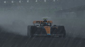 Oscar Piastri in the Imola rain in his McLaren F1 car.jpg