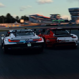 GTE cars racing in assetto corsa